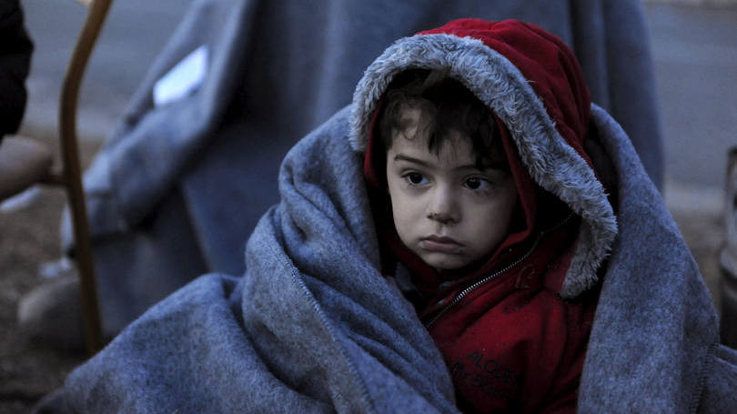 Criança refugiada: "O Ministério da Defesa assumiu o compromisso de completar os trabalhos nos centros até o dia 15 (de fevereiro)", declarou Kammenos aos repórteres