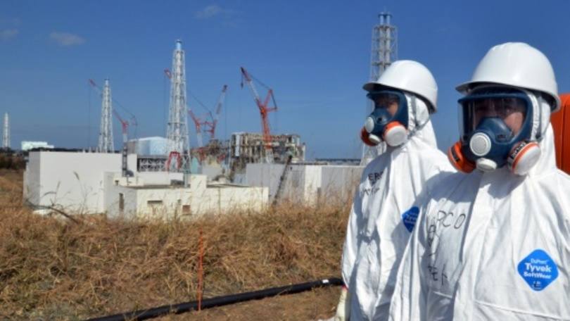 Trabalhadores na usina nuclear de Okuma, Fukushima: novos procedimentos de segurança envolverão visitas surpresa e mais poder a inspetores.